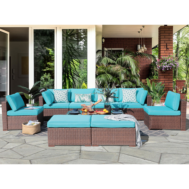Ebern Designs Ingwar 10 Piece Rattan Sectional Seating Group with